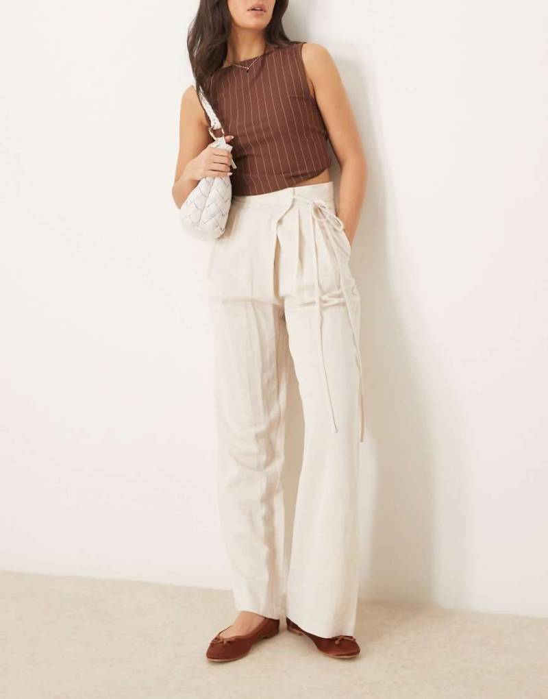 ASOS DESIGN - Weit geschnittene Leinenhose in Stein mit Bindedetail vorne-Neutral von ASOS DESIGN