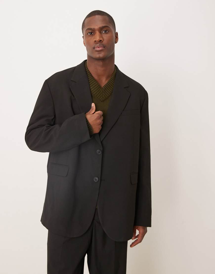 ASOS DESIGN - Weit geschnittene Oversize-Anzugjacke in Schwarz ASOS DESIGN - Weit geschnittene Oversize-Anzugjacke in Schwarz von ASOS DESIGN