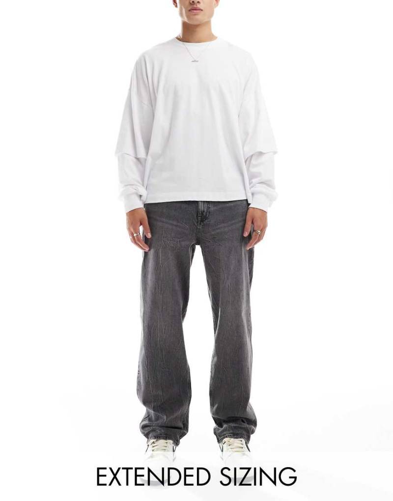 ASOS DESIGN - Weit geschnittene Stretch-Jeans in verwaschenem Grau von ASOS DESIGN