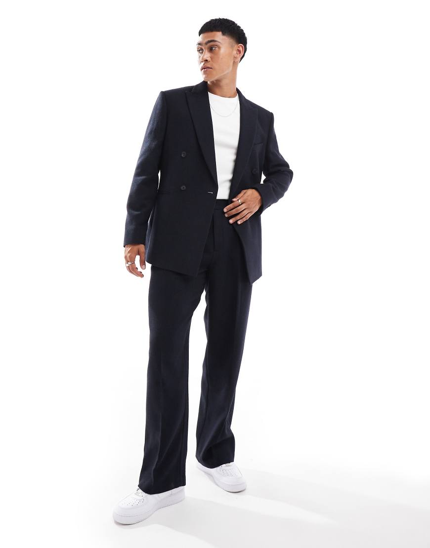 ASOS DESIGN - Weit geschnittene Twill-Anzughose aus Wollmischung in Marineblau-Schwarz von ASOS DESIGN