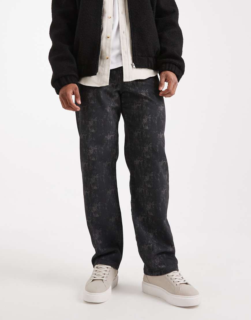 ASOS DESIGN - Weite, gemusterte Jeans in Schwarz von ASOS DESIGN
