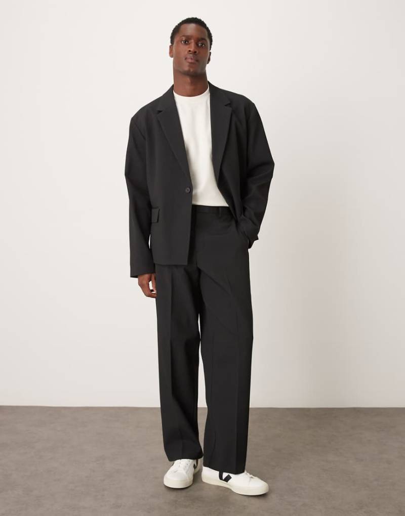 ASOS DESIGN - Weite, gerippte Anzughose in Schwarz von ASOS DESIGN