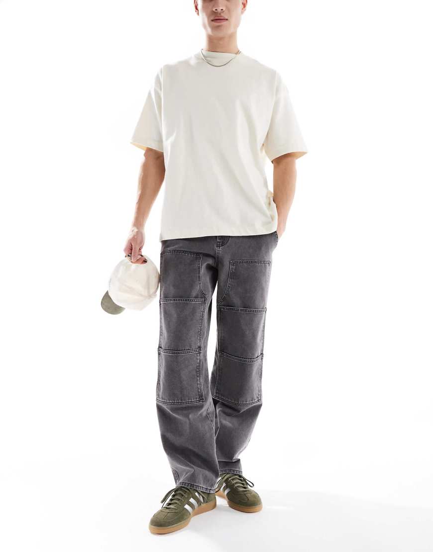 ASOS DESIGN - Weite Carpenter-Jeans in verwaschenem Schwarz-Braun von ASOS DESIGN