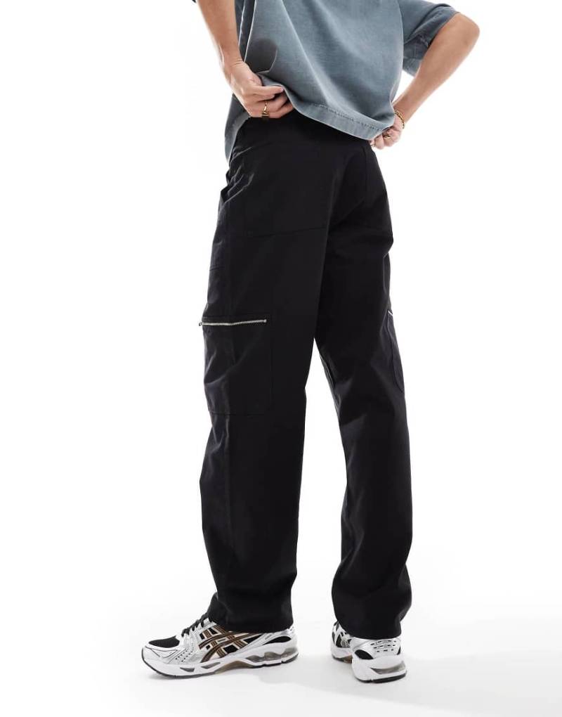 ASOS DESIGN - Weite Carpenter-Hose in verwaschenem Schwarz mit Reißverschluss-Details von ASOS DESIGN