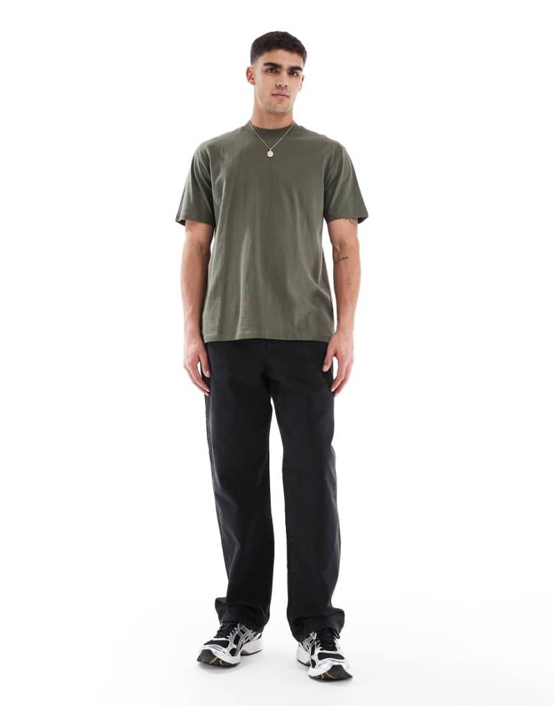 ASOS DESIGN - Weite Carpenter-Jeans in Schwarz von ASOS DESIGN