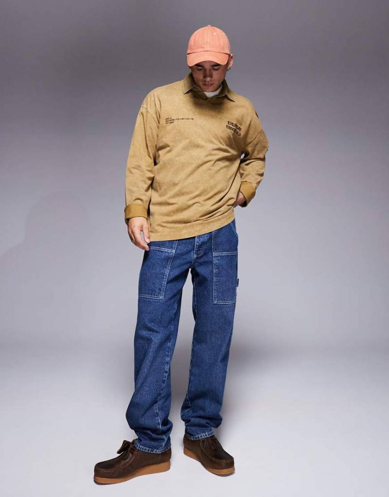 ASOS DESIGN - Weite Carpenter-Jeans in dunkelblauer Waschung von ASOS DESIGN