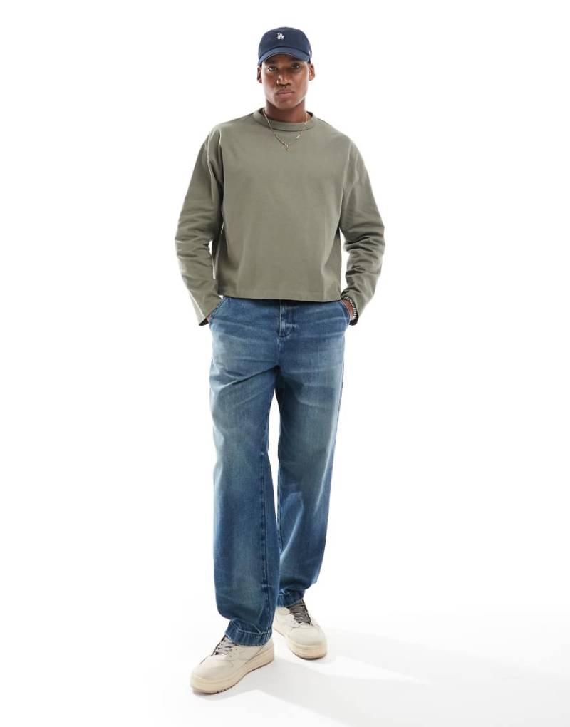 ASOS DESIGN - Weite Carpenter-Jeans in dunkelblauer Waschung von ASOS DESIGN