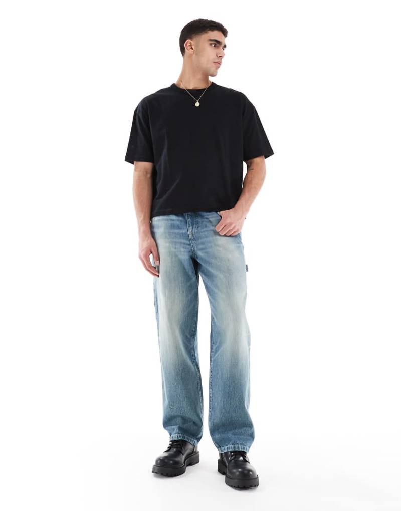 ASOS DESIGN - Weite Carpenter-Jeans in hellblauer Waschung von ASOS DESIGN