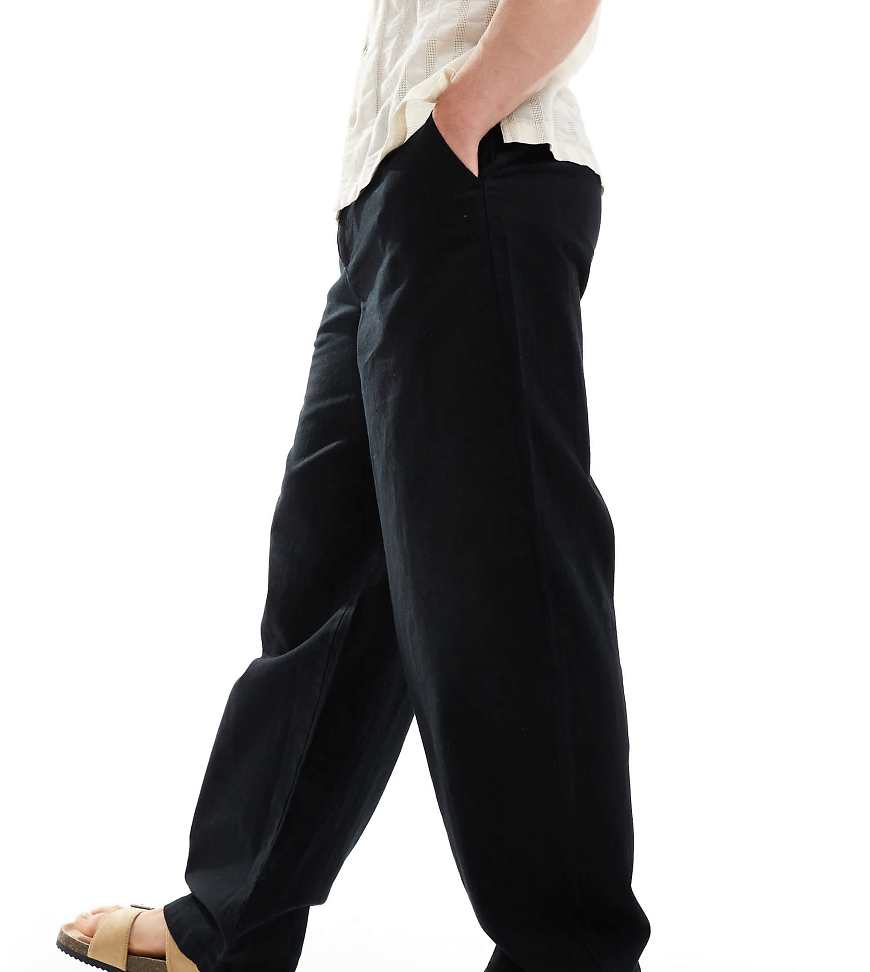 ASOS DESIGN - Weite Chinohose aus Leinen in Schwarz ASOS DESIGN - Weite Chinohose aus Leinen in Schwarz von ASOS DESIGN
