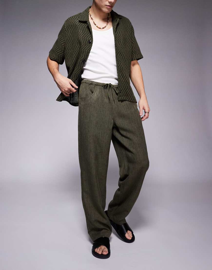 ASOS DESIGN - Weite Hose in Khaki mit Tunnelzug-Grün von ASOS DESIGN