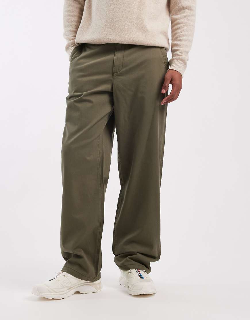 ASOS DESIGN - Weite Hose in Khaki mit schräg angesetzten Taschen-Grün von ASOS DESIGN