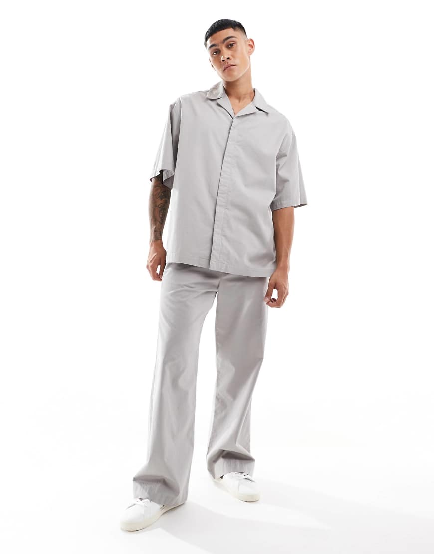 ASOS DESIGN - Weite Hose in neutralem Farbton mit elastischem Bund, Kombiteil ASOS DESIGN - Weite Hose in neutralem Farbton mit elastischem Bund, Kombiteil von ASOS DESIGN