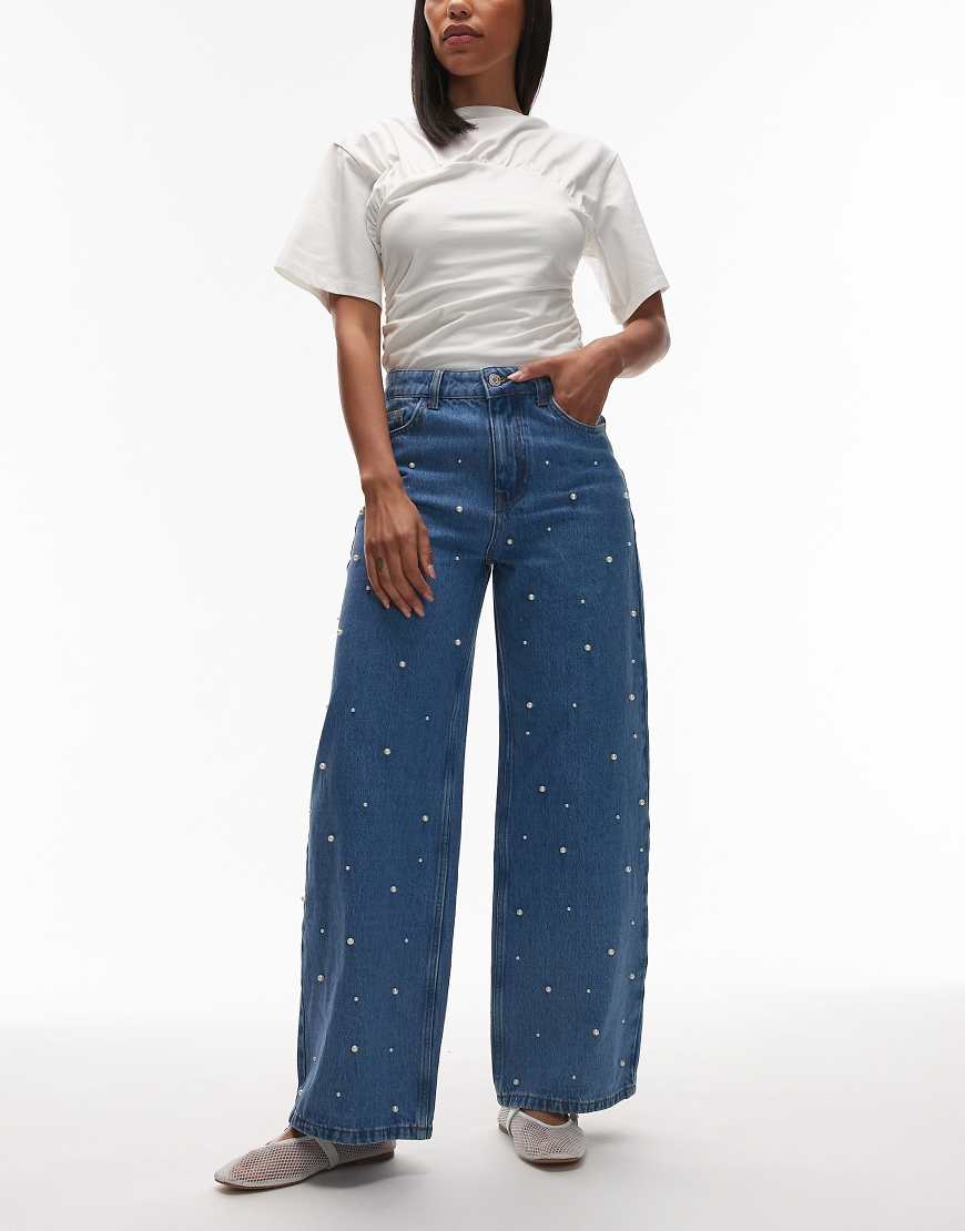 ASOS DESIGN - Weite Jeans in Mittelblau mit Perlendetail-Marineblau ASOS DESIGN - Weite Jeans in Mittelblau mit Perlendetail-Marineblau von ASOS DESIGN