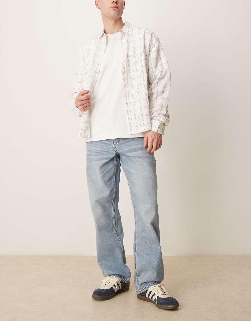 ASOS DESIGN - Weite Jeans in verwaschenem Hellblau ASOS DESIGN - Weite Jeans in verwaschenem Hellblau von ASOS DESIGN