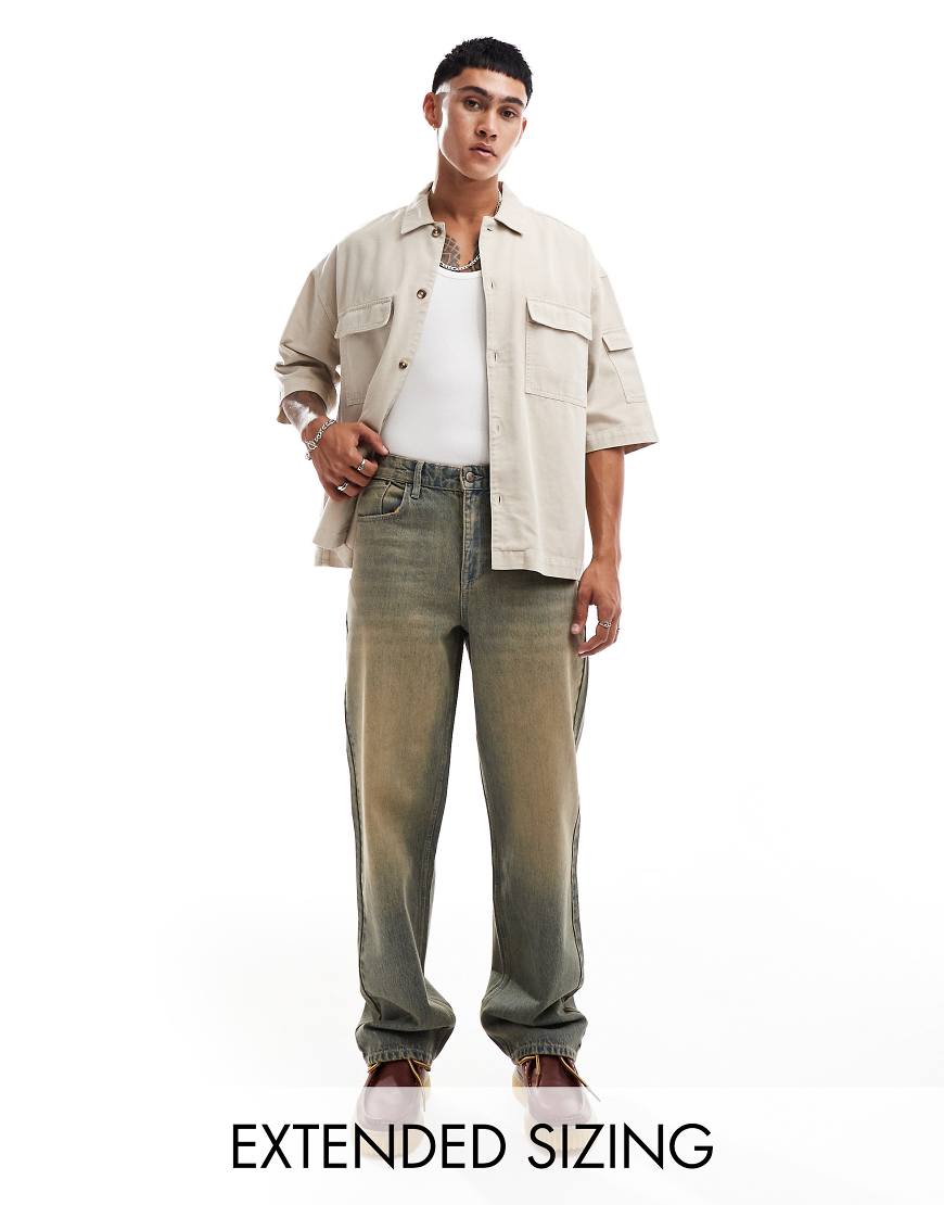 ASOS DESIGN - Weite Jeans in verwaschenem Mittelblau mit Farbstich in Vintage-Braun ASOS DESIGN - Weite Jeans in verwaschenem Mittelblau mit Farbstich in Vintage-Braun von ASOS DESIGN