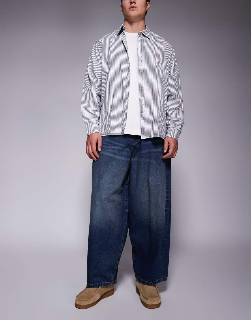 ASOS DESIGN - Weite Oversize-Jeans in Dunkelblau mit Vintage-Waschung von ASOS DESIGN