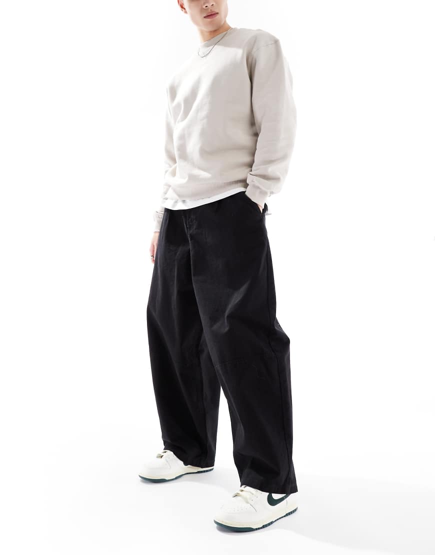 ASOS DESIGN - Weite Oversize-Chinohose in Schwarz ASOS DESIGN - Weite Oversize-Chinohose in Schwarz von ASOS DESIGN