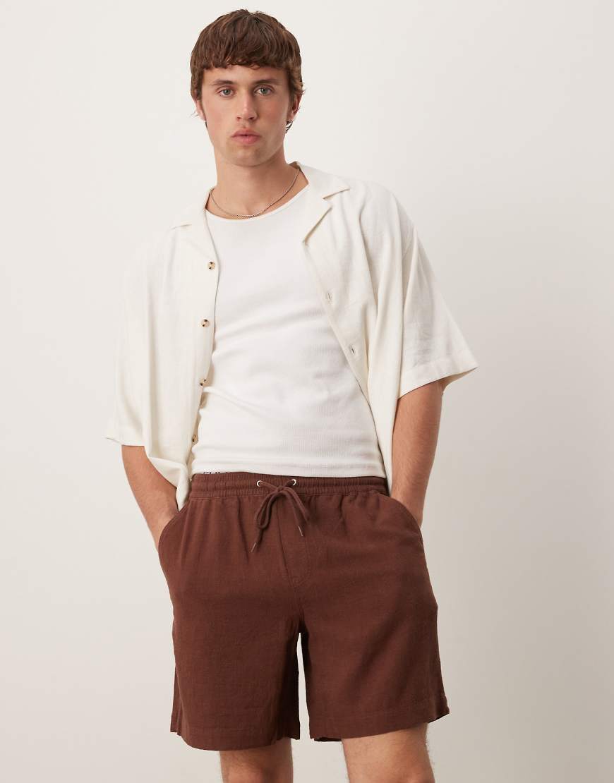 ASOS DESIGN - Weite Shorts zum Reinschlüpfen mit hohem Leinenanteil in Braun ASOS DESIGN - Weite Shorts zum Reinschlüpfen mit hohem Leinenanteil in Braun von ASOS DESIGN