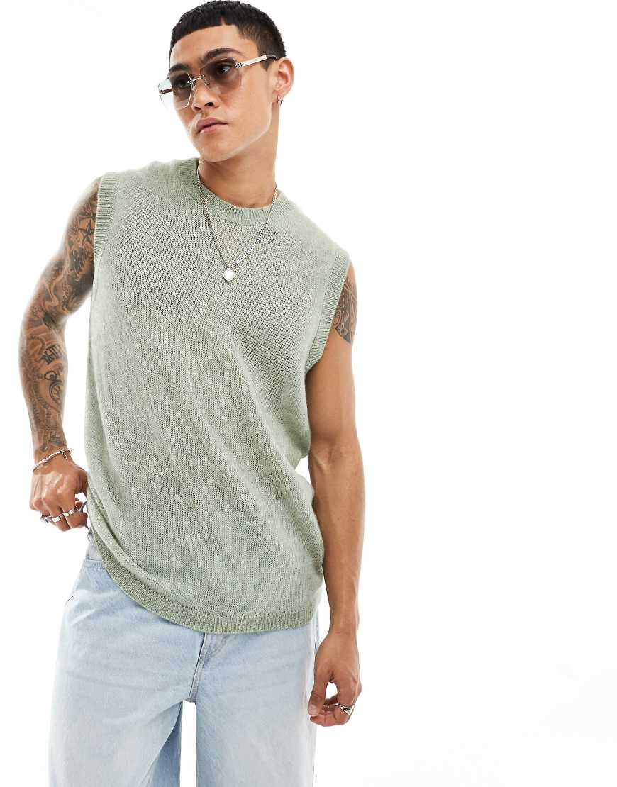 ASOS DESIGN - Weitmaschiges, locker geschnittenes Trägertop aus Strick in Grün ASOS DESIGN - Weitmaschiges, locker geschnittenes Trägertop aus Strick in Grün von ASOS DESIGN