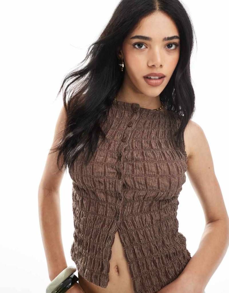 ASOS DESIGN - Weste in Braun mit strukturierter Acid-Waschung und Knopfleiste, Kombiteil von ASOS DESIGN