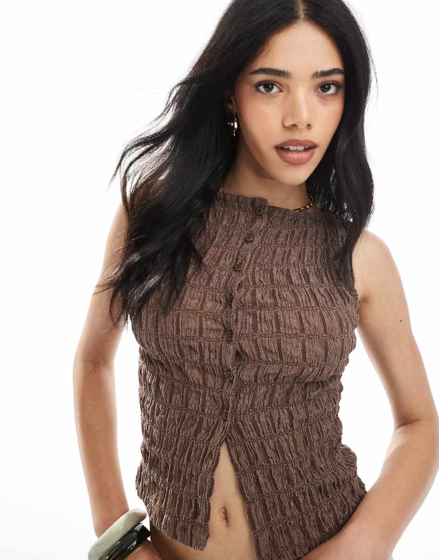 ASOS DESIGN - Weste in Braun mit strukturierter Acid-Waschung und Knopfleiste, Kombiteil ASOS DESIGN - Weste in Braun mit strukturierter Acid-Waschung und Knopfleiste, Kombiteil von ASOS DESIGN