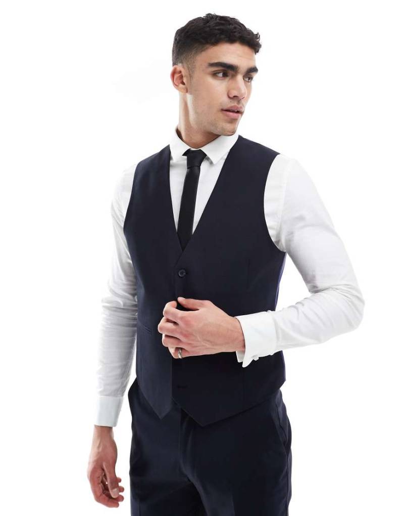ASOS DESIGN - Weste mit schmalem Schnitt in dunklem Marineblau von ASOS DESIGN