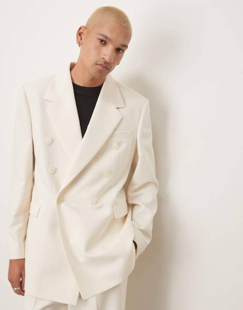 ASOS DESIGN - Zweireihige, lässig geschnittene Longline-Anzugjacke in Creme mit Struktur-Weiß von ASOS DESIGN