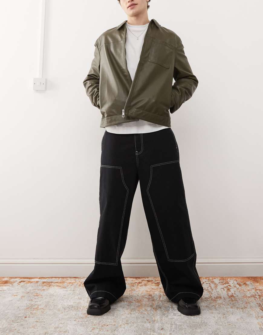 ASOS DESIGN s- Extrem weit geschnittene Chinohose in Schwarz mit Kontrastnaht und Carpenter-Design von ASOS DESIGN