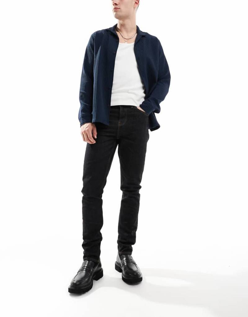 ASOS DESIGN s- Jeans mit engem Schnitt in indigoblauer Waschung von ASOS DESIGN