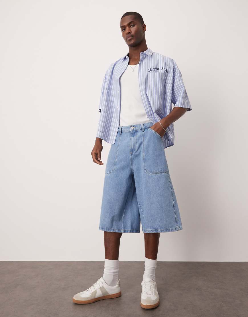 ASOS DESIGN - Jeans-Jorts in mittelblauer Waschung ASOS DESIGN - Jeans-Jorts in mittelblauer Waschung von ASOS DESIGN