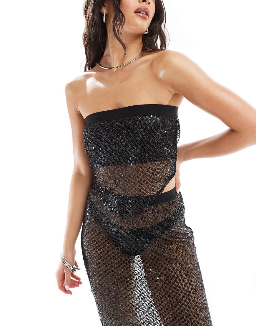 ASOS Design - Trägerloses Oberteil in Schwarz aus weitmaschigem Netzstoff mit Pailletten und Tuchsaum, Kombiteil ASOS Design - Trägerloses Oberteil in Schwarz aus weitmaschigem Netzstoff mit Pailletten und Tuchsaum, Kombiteil von ASOS DESIGN