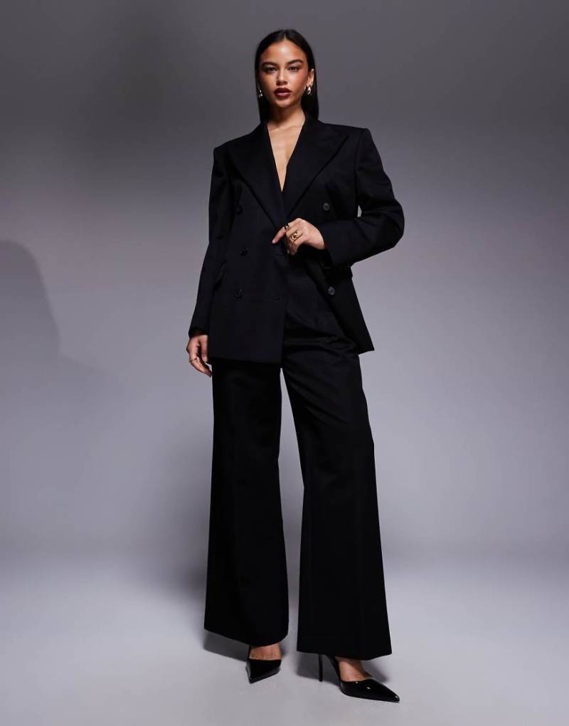 ASOS X THE SOURCED COLLECTION - Anzughose in Schwarz von ASOS DESIGN