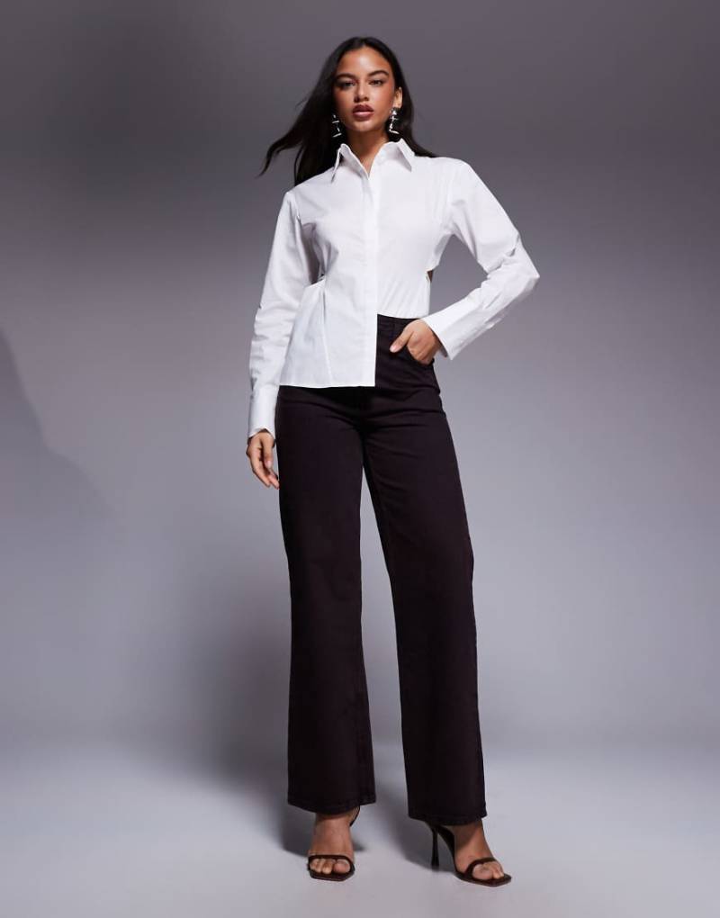 ASOS X THE SOURCED COLLECTION - Jeans in Braun-Brown von ASOS DESIGN