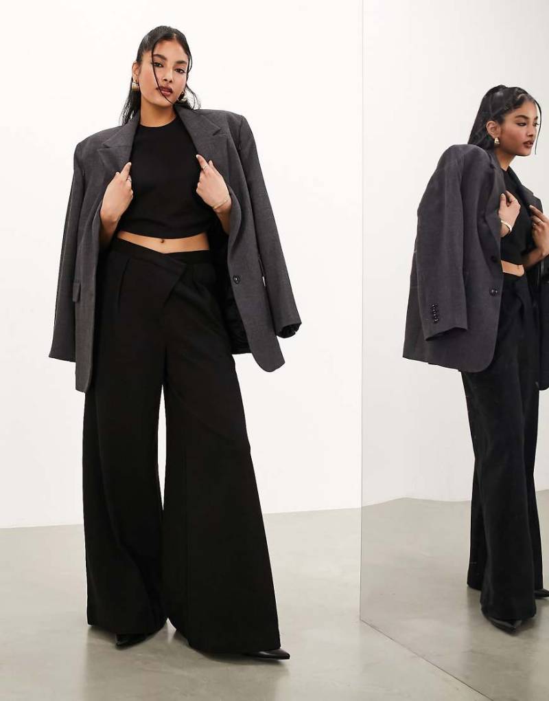 ASOS EDITION - Hose aus erstklassigem, strukturiertem Jersey in Schwarz mit weitem Bein und asymmetrischem Bund von ASOS EDITION