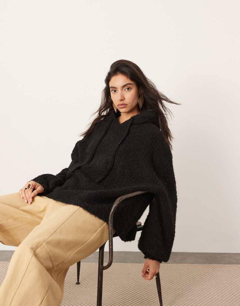 ASOS EDITION - Oversize-Kapuzenpullover aus Bouclé-Strick in Schwarz von ASOS EDITION