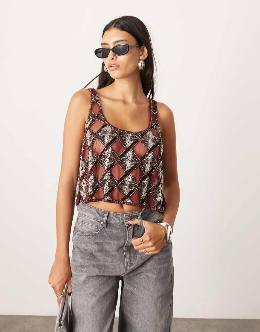 ASOS EDITION - Trägertop in Rot mit geometrischer Verzierung im Lochmusterdesign-Bunt ASOS EDITION - Trägertop in Rot mit geometrischer Verzierung im Lochmusterdesign-Bunt von ASOS EDITION