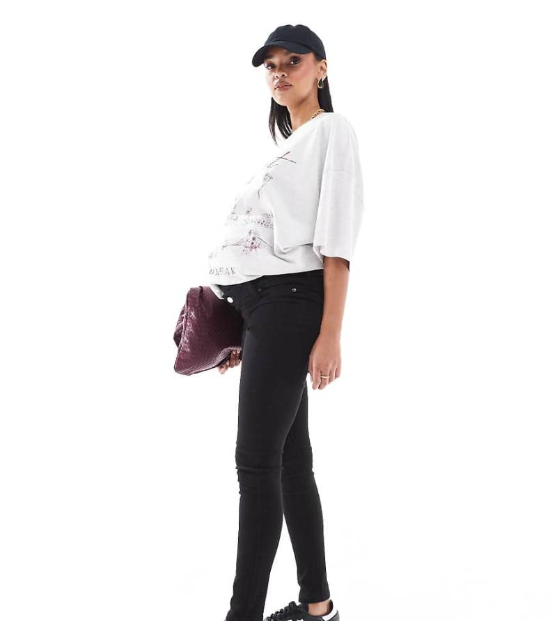 ASOS DESIGN Maternity - Eng geschnittene Umstandsjeans in reinem Schwarz von ASOS Maternity