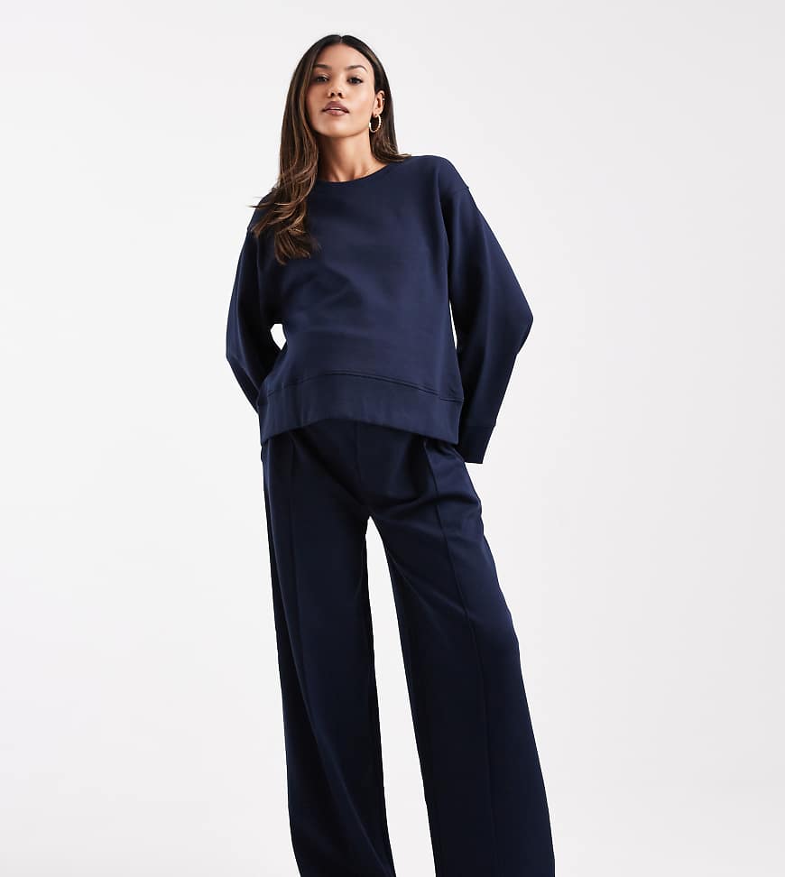 ASOS DESIGN Maternity - Hose aus Interlock-Stoff in Marineblau mit weitem Bein von ASOS Maternity
