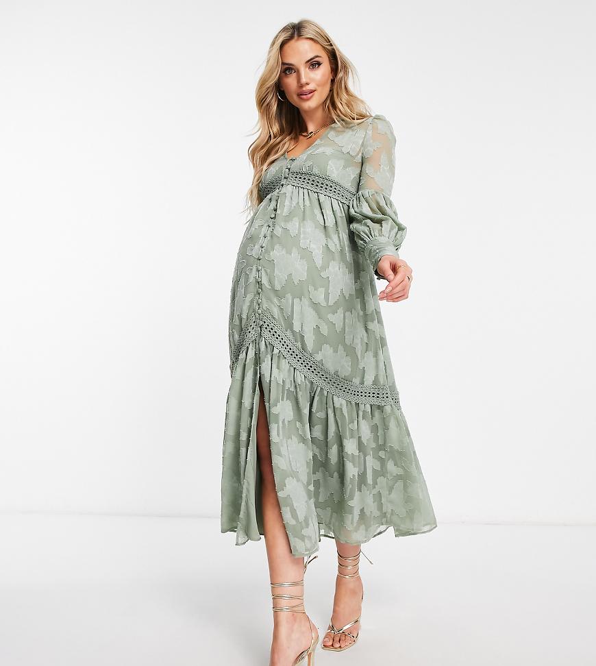 ASOS DESIGN Maternity - Midi-Hemdkleid in Khaki mit Knopfleiste sowie Einsätzen aus Spitze im Ausbrenner-Muster-Grün ASOS DESIGN Maternity - Midi-Hemdkleid in Khaki mit Knopfleiste sowie Einsätzen aus Spitze im Ausbrenner-Muster-Grün von ASOS Maternity