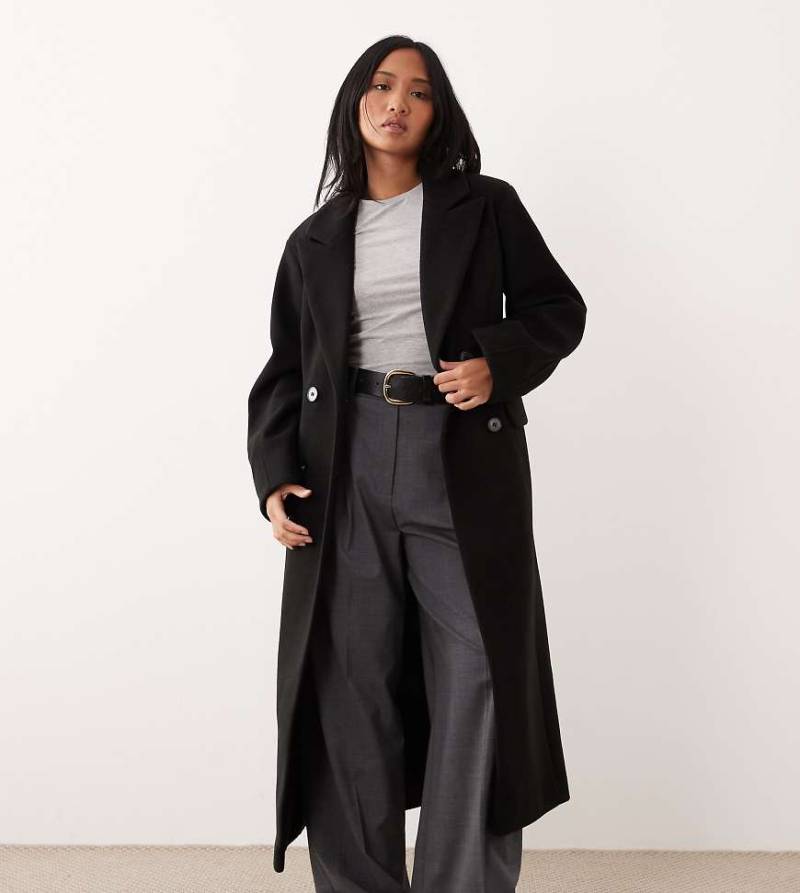 ASOS DESIGN Petite - Eleganter, figurbetonter Longline-Mantel in Schwarz ASOS DESIGN Petite - Eleganter, figurbetonter Longline-Mantel in Schwarz von ASOS Petite