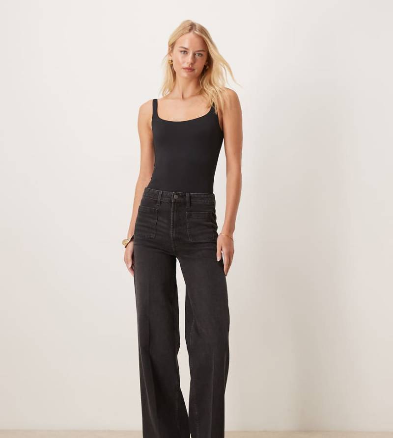 ASOS DESIGN Tall - Jeans in Schwarz mit hohem Bund, weitem Schnitt und Vordertaschen von ASOS Tall