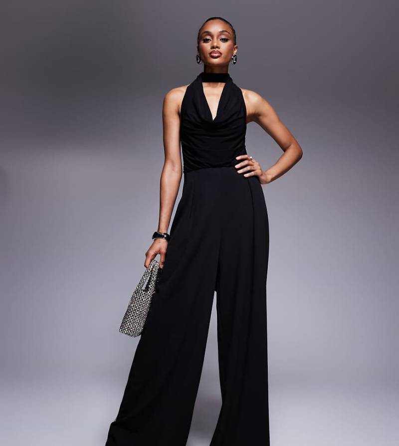 ASOS DESIGN Tall - Jumpsuit in Schwarz aus Materialmix mit weitem Bein, Wasserfallausschnitt und Bindedetail am Ausschnitt von ASOS Tall