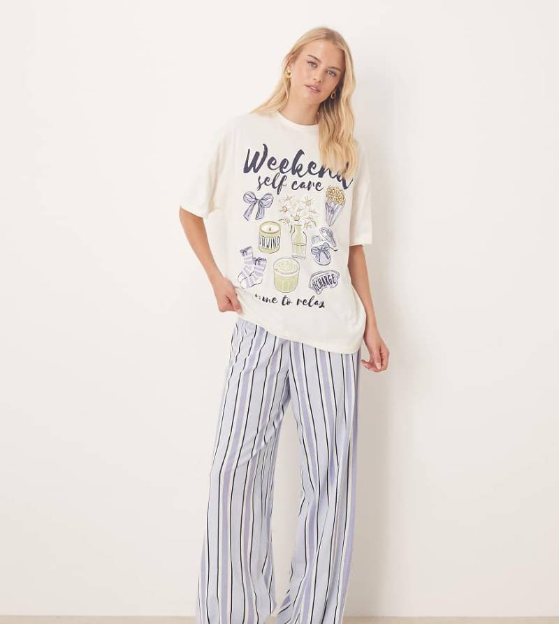 ASOS DESIGN Tall - Pyjama aus Oversize-T-Shirt mit „Weekend Self Care"-Grafikmotiv und Hose mit weitem Bein-Grün von ASOS Tall