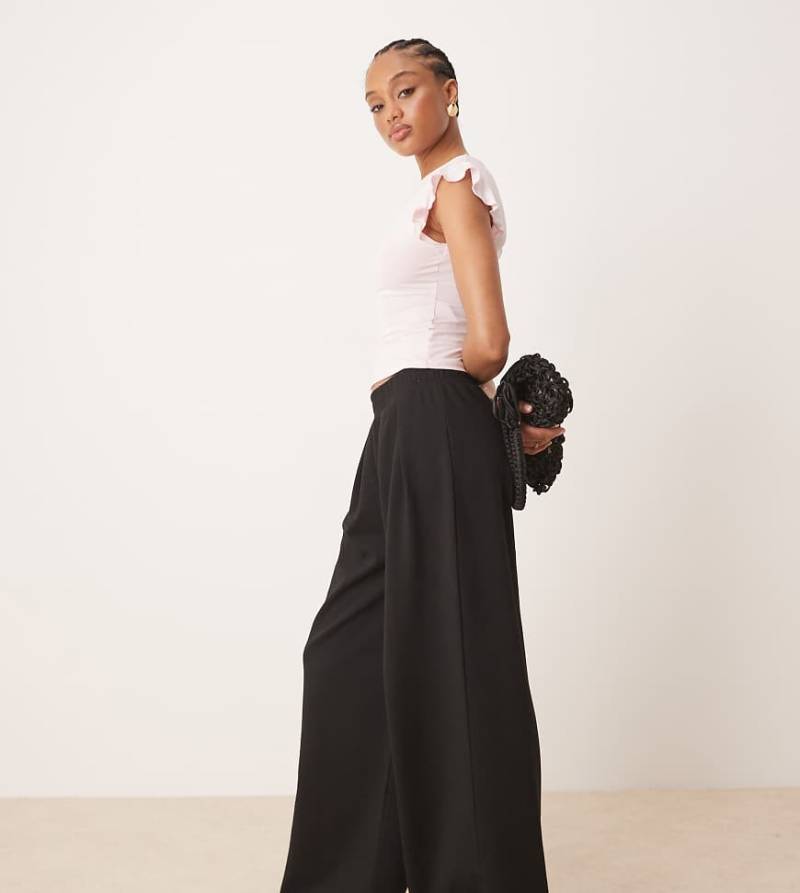 ASOS DESIGN Tall - Superweite Hose aus Interlock-Stoff in Schwarz ASOS DESIGN Tall - Superweite Hose aus Interlock-Stoff in Schwarz von ASOS Tall
