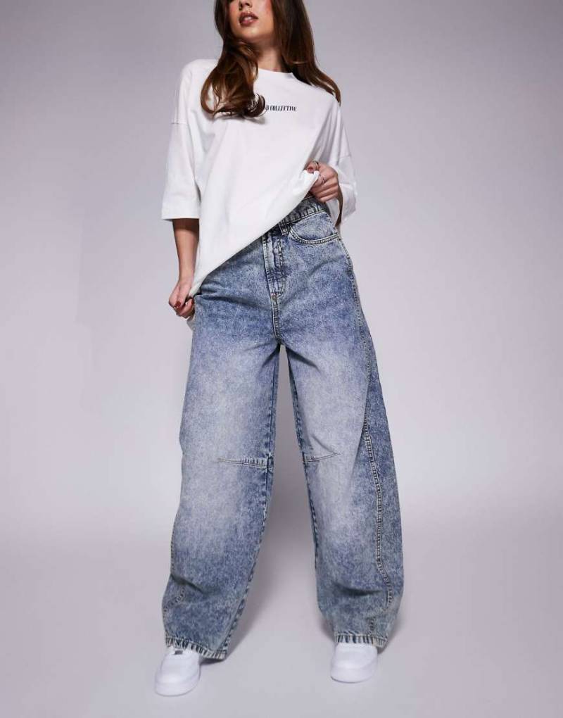Weekend Collective - Jeans in blauer Bleach-Waschung mit abgerundetem Beinschnitt von ASOS Weekend Collective