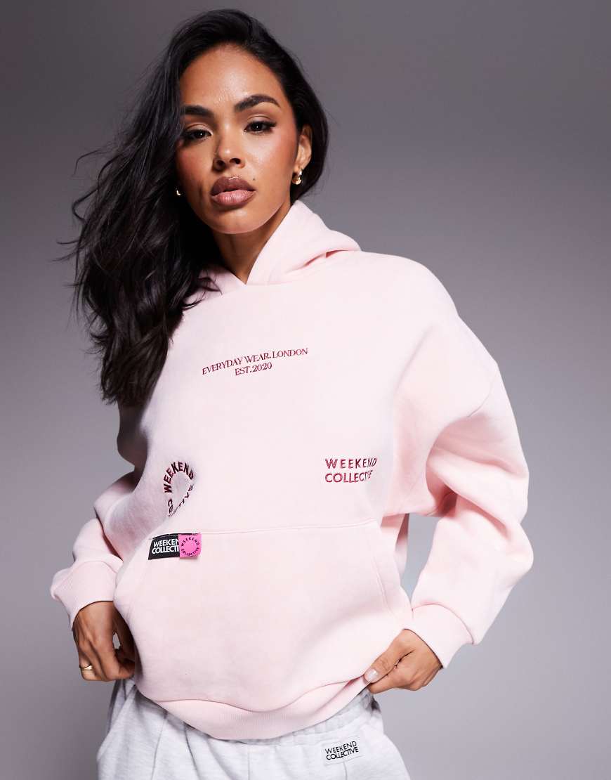Weekend Collective - Kapuzenpullover in verwaschenem Rosa mit Logo-Details in leuchtendem Rosa Weekend Collective - Kapuzenpullover in verwaschenem Rosa mit Logo-Details in leuchtendem Rosa von ASOS Weekend Collective