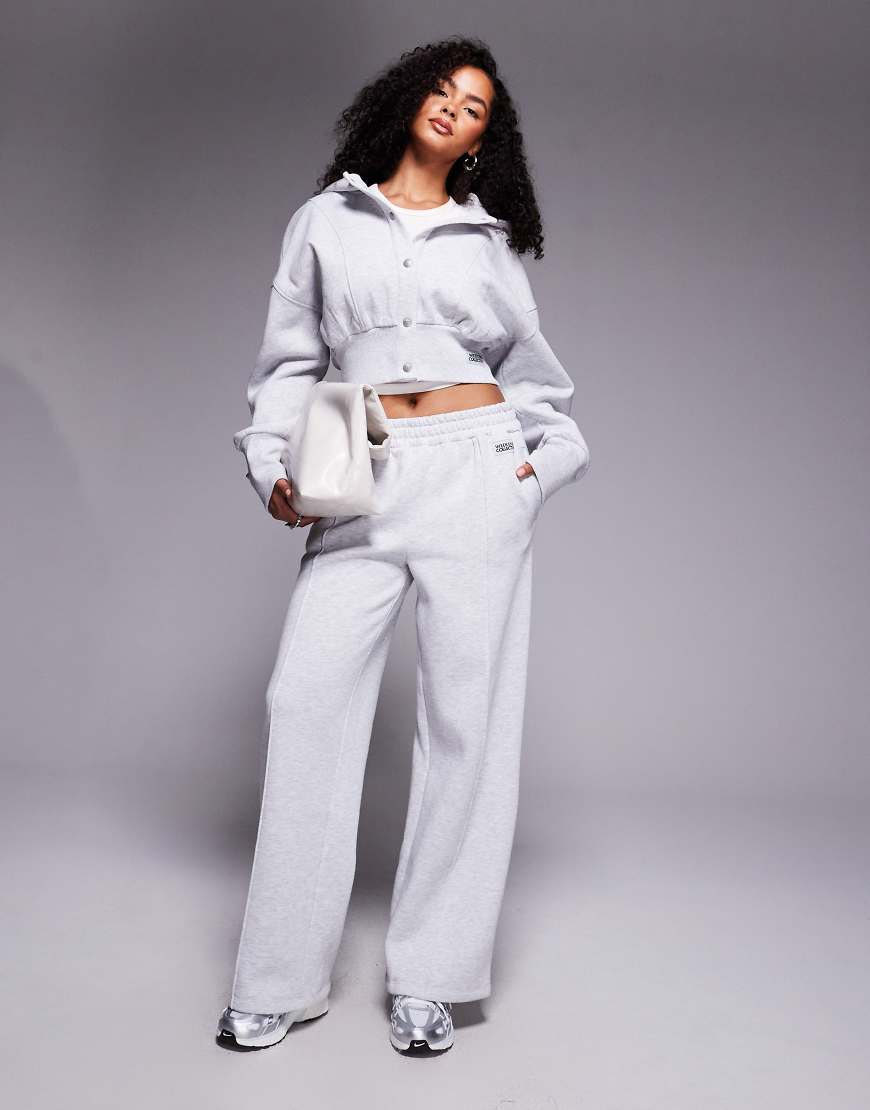 Weekend Collective - Weit geschnittene Jogginghose in meliertem Grau mit Biesen Weekend Collective - Weit geschnittene Jogginghose in meliertem Grau mit Biesen von ASOS Weekend Collective