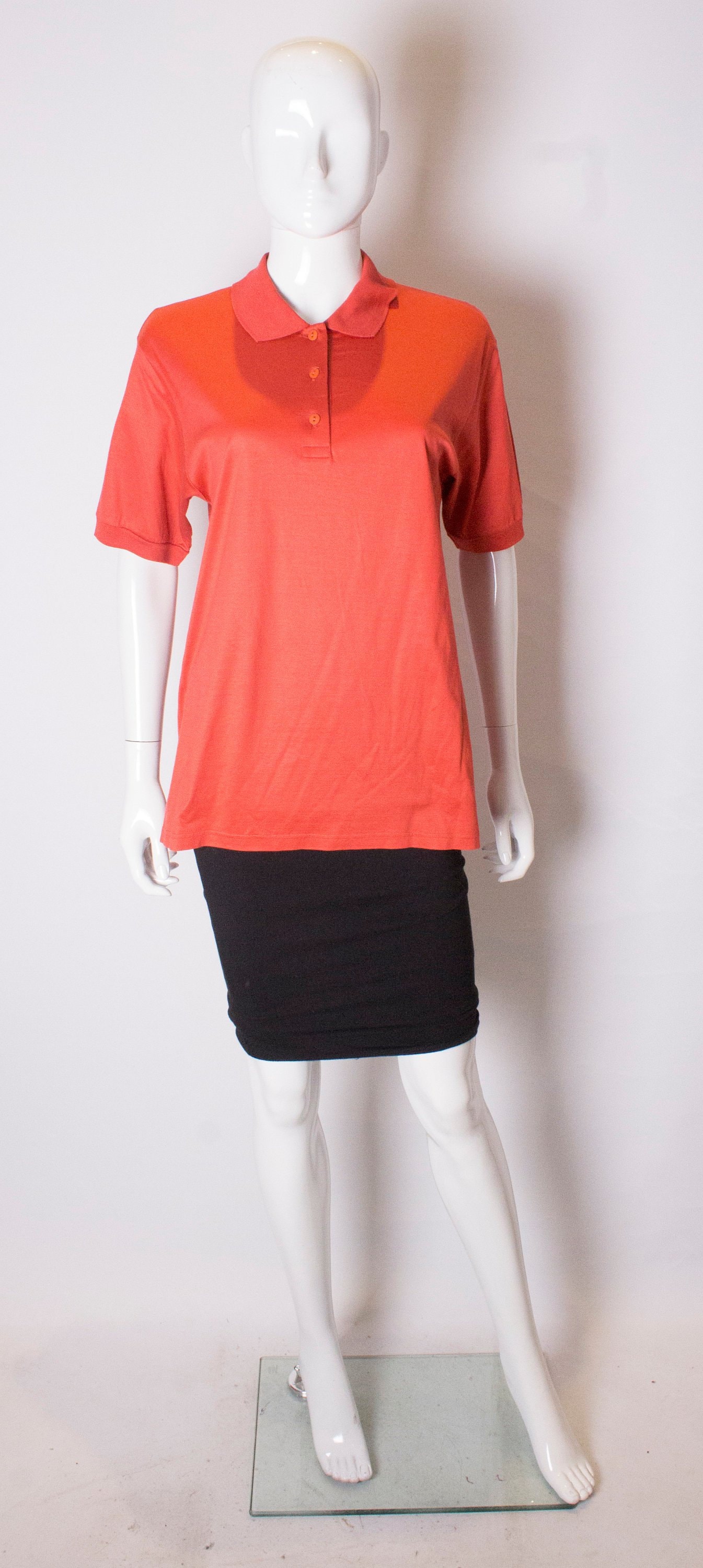 Ein Vintage 1990Er Jahre Orange-Celine-Polo-Shirt von AardvarkvintageGoods