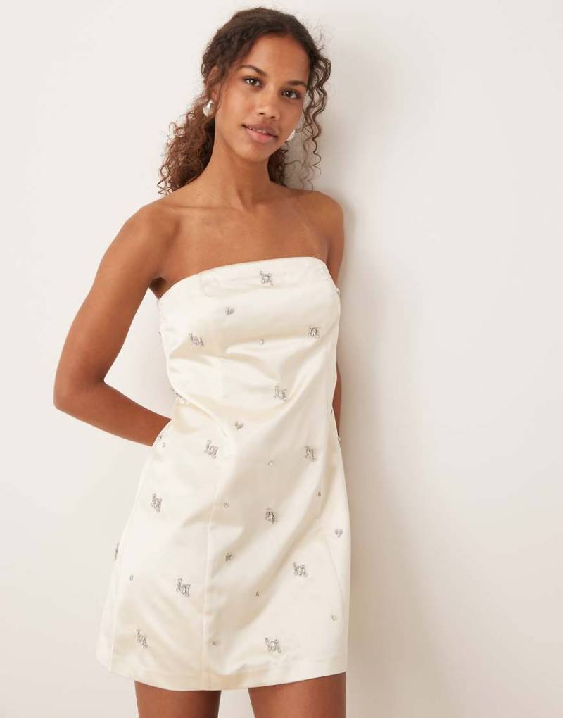 Abercrombie & Fitch - Trägerloses, verziertes Satinkleid in Creme-Weiß Abercrombie & Fitch - Trägerloses, verziertes Satinkleid in Creme-Weiß von Abercrombie & Fitch