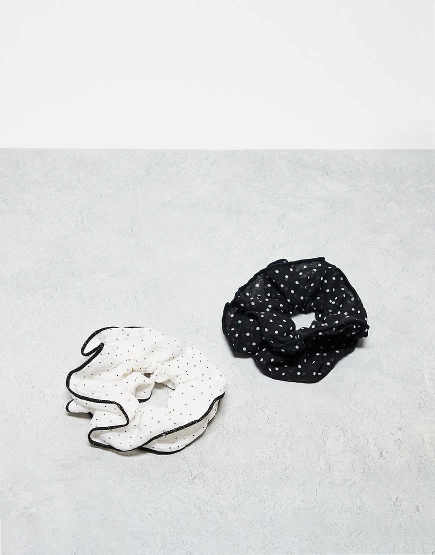 Accessorize - 2er-Pack Scrunchie-Haargummis aus Organza mit Punktemuster in Schwarz und Weiß Accessorize - 2er-Pack Scrunchie-Haargummis aus Organza mit Punktemuster in Schwarz und Weiß von Accessorize